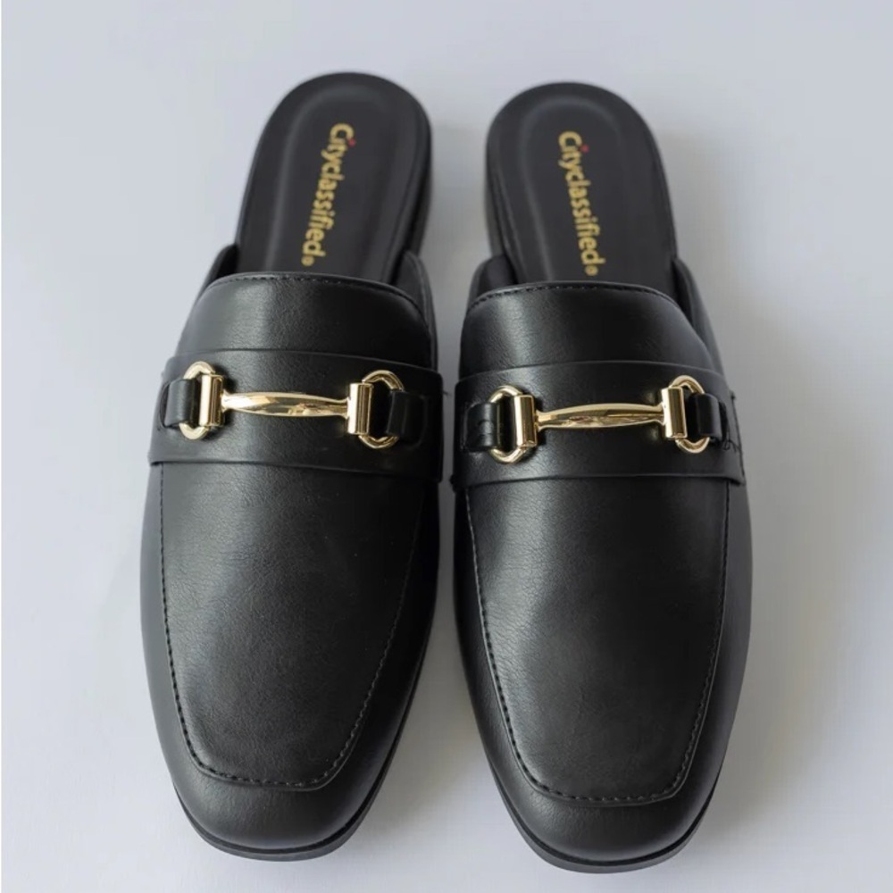 Cityclassified Slip-On Mules with Gold Buckles in Black Faux Leather
